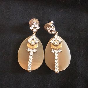 Bone and rhinestone earrings
